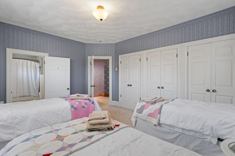 Bedroom - Lena Blue looking at hallway and bath